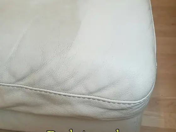 Čistenie koženej sedačky v Bratislave, detail rohu sedáka v smotanovej farbe na parketách